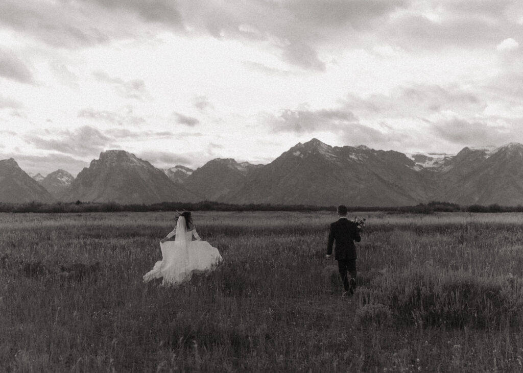 grand tetons national park, running field bride and groom photos, wyoming intimate wedding, wyoming elopement
